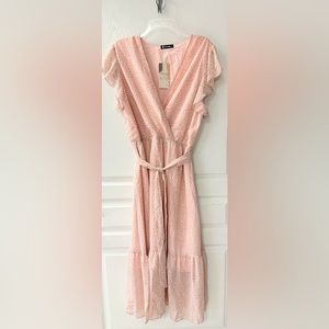 Cute pink and white spring and summer dress.